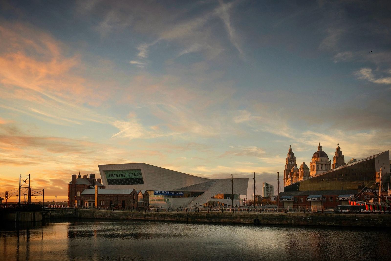 The Liverpool waterfront at dusk, with the Museum of Liverpool and the Royal Liver Building